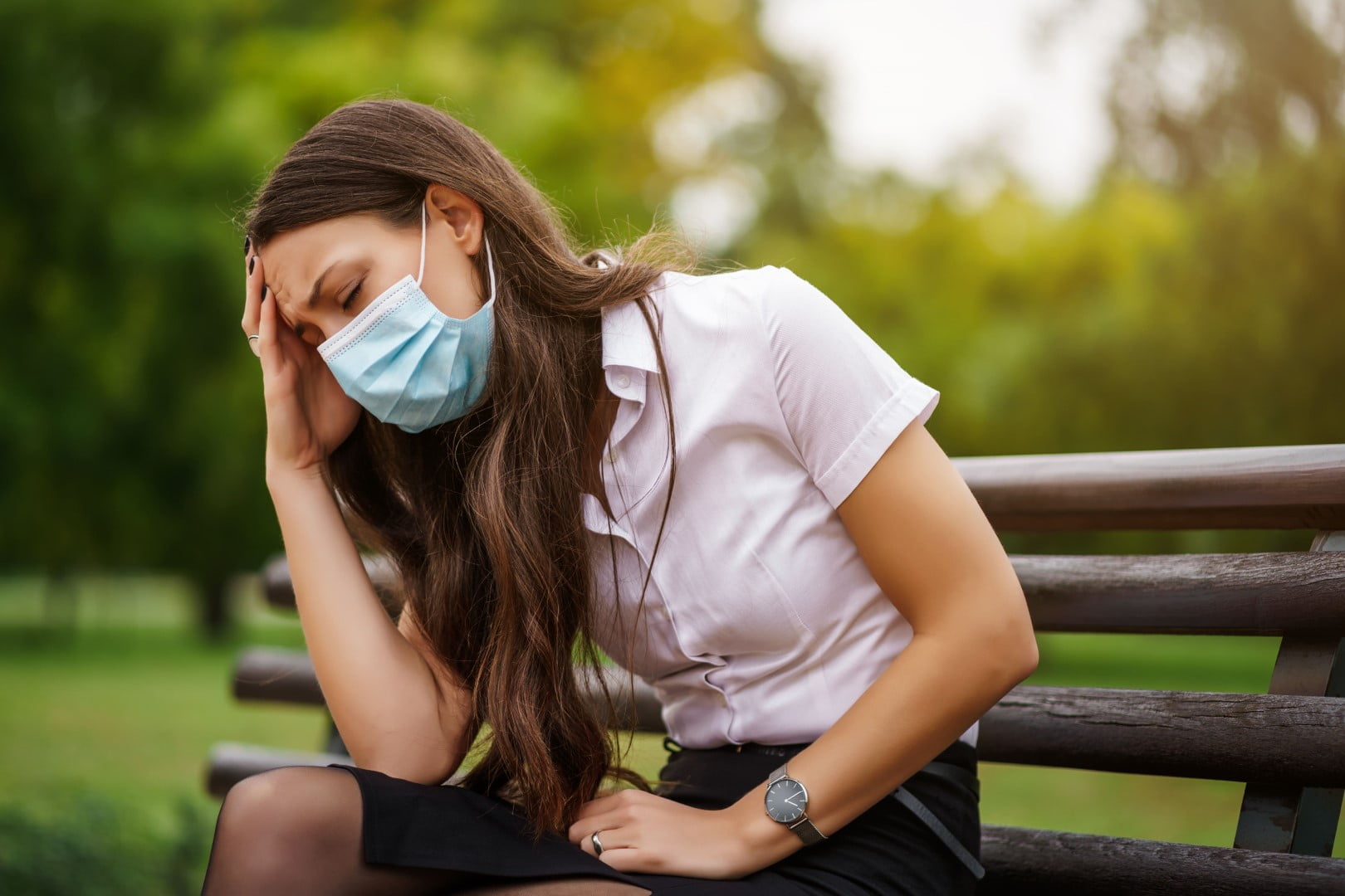 woman feeling dizzy due to hypertension