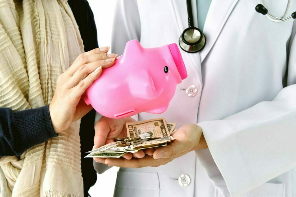 health insurance saving in piggy bank