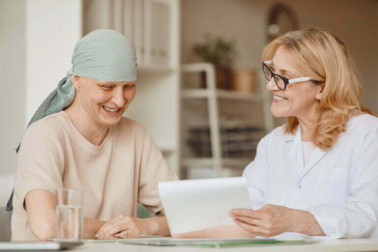 cancer patient looking at test results cancer patient looking at test results
