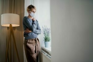 Woman with depression at home during covid-19