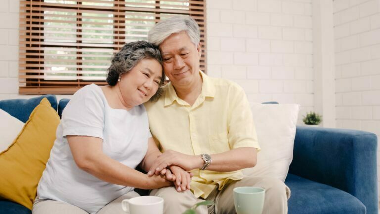 Elderly couple with healthy heart at home