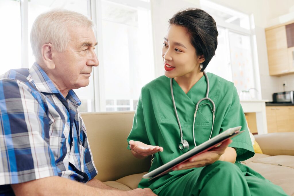 nurse visiting a patient enrolled in hospital care at home program