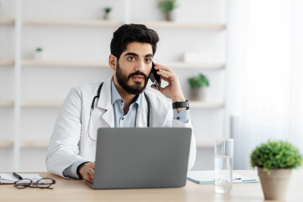 doctor doing remote patient monitoring during covid