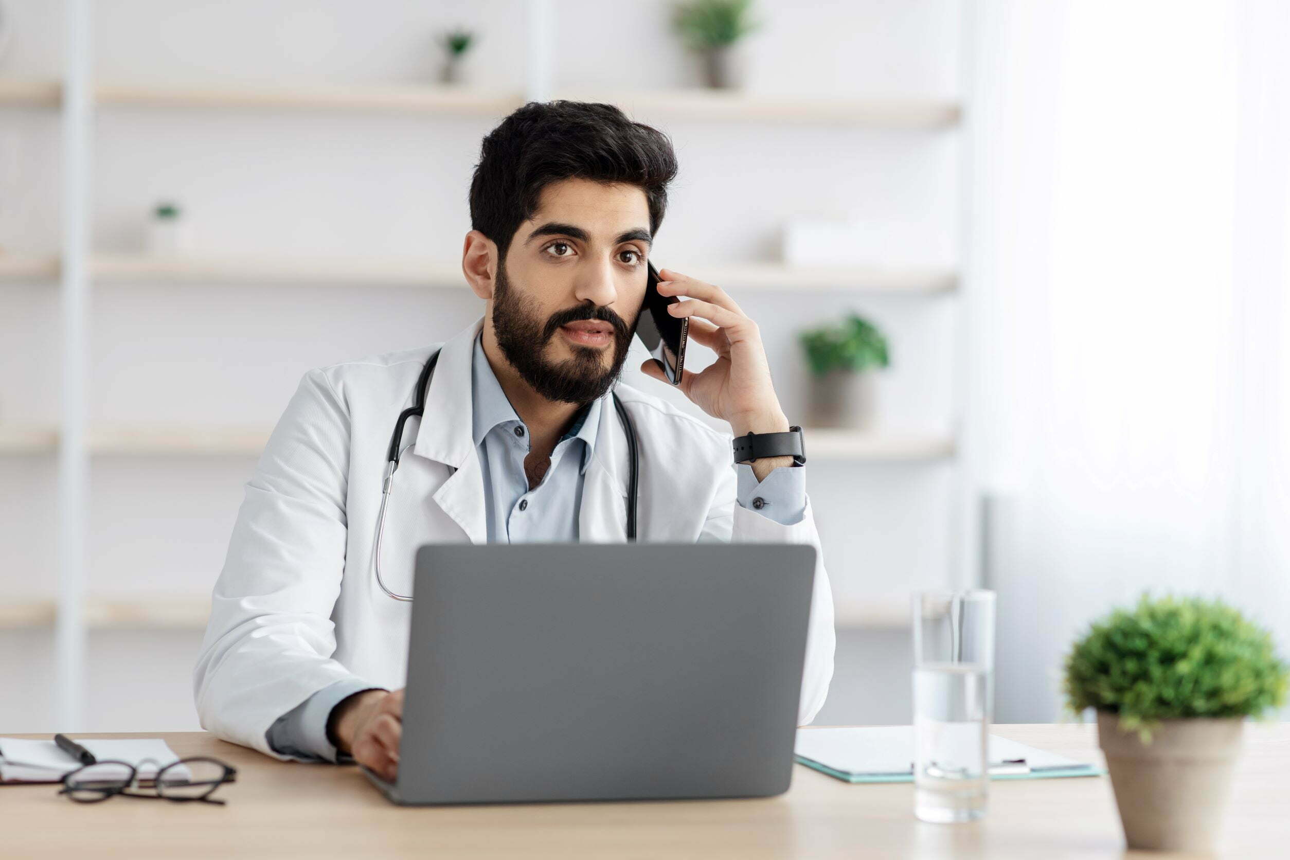 doctor doing remote patient monitoring during covid doctor doing remote patient monitoring during covid