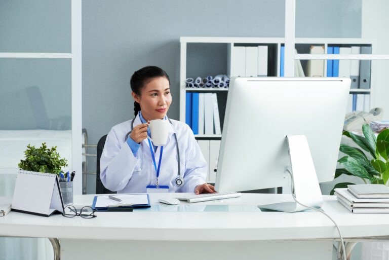 doctor working on remote patient monitoring doctor working on remote patient monitoring
