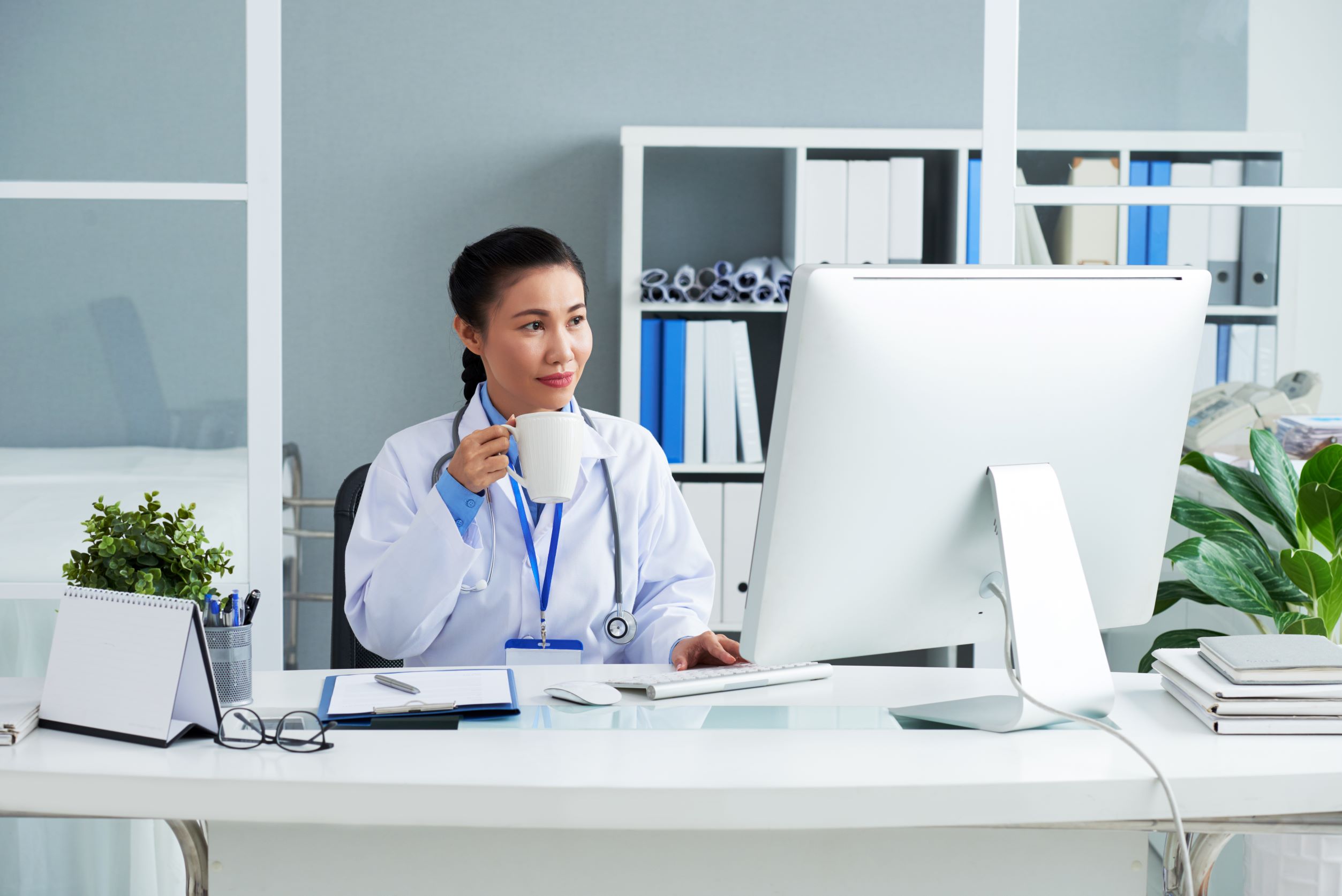 doctor working on remote patient monitoring doctor working on remote patient monitoring