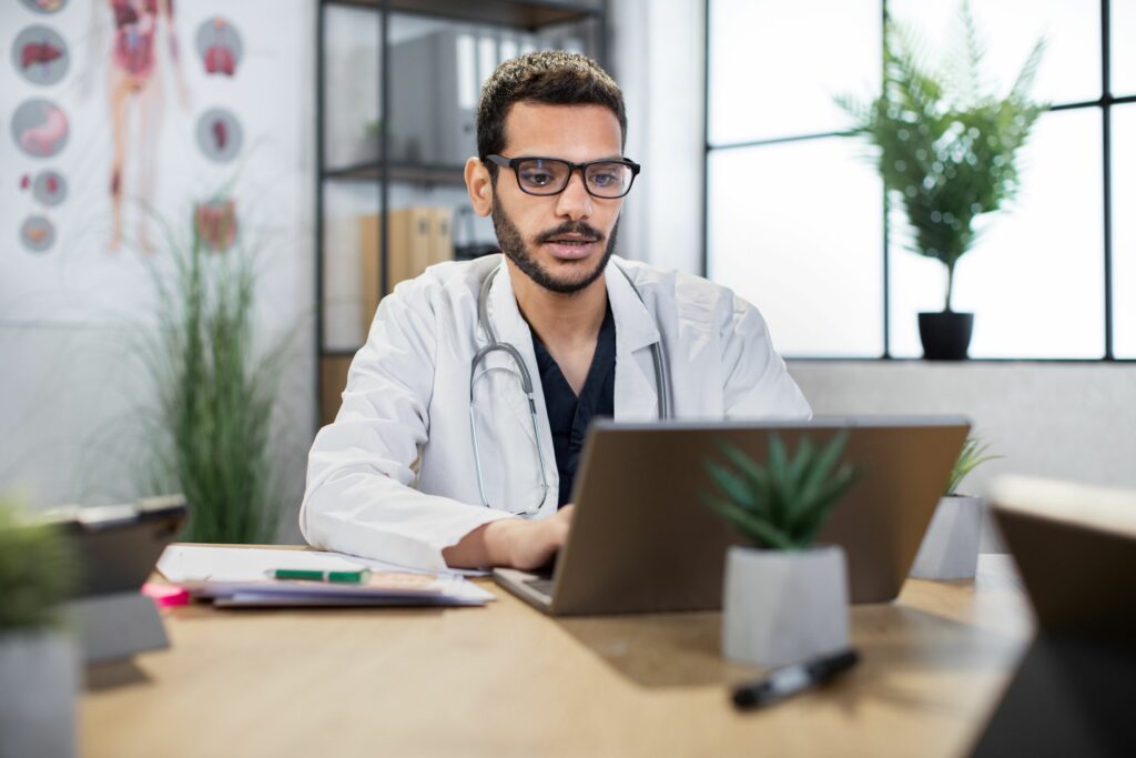 doctor using remote patient monitoring