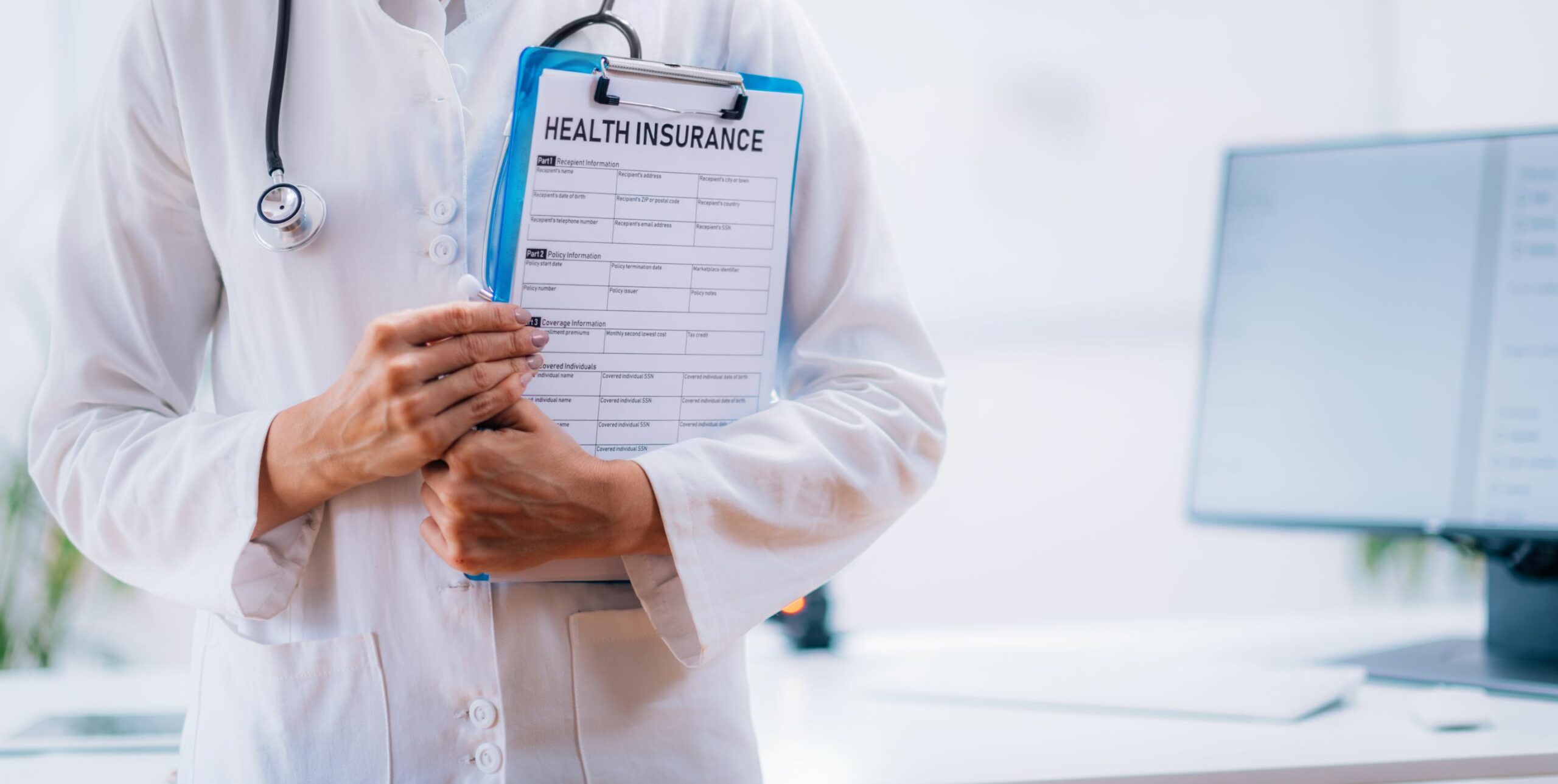doctor carrying health insurance form doctor carrying health insurance form