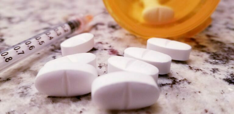 open pill bottle opioid addiction open pill bottle opioid addiction