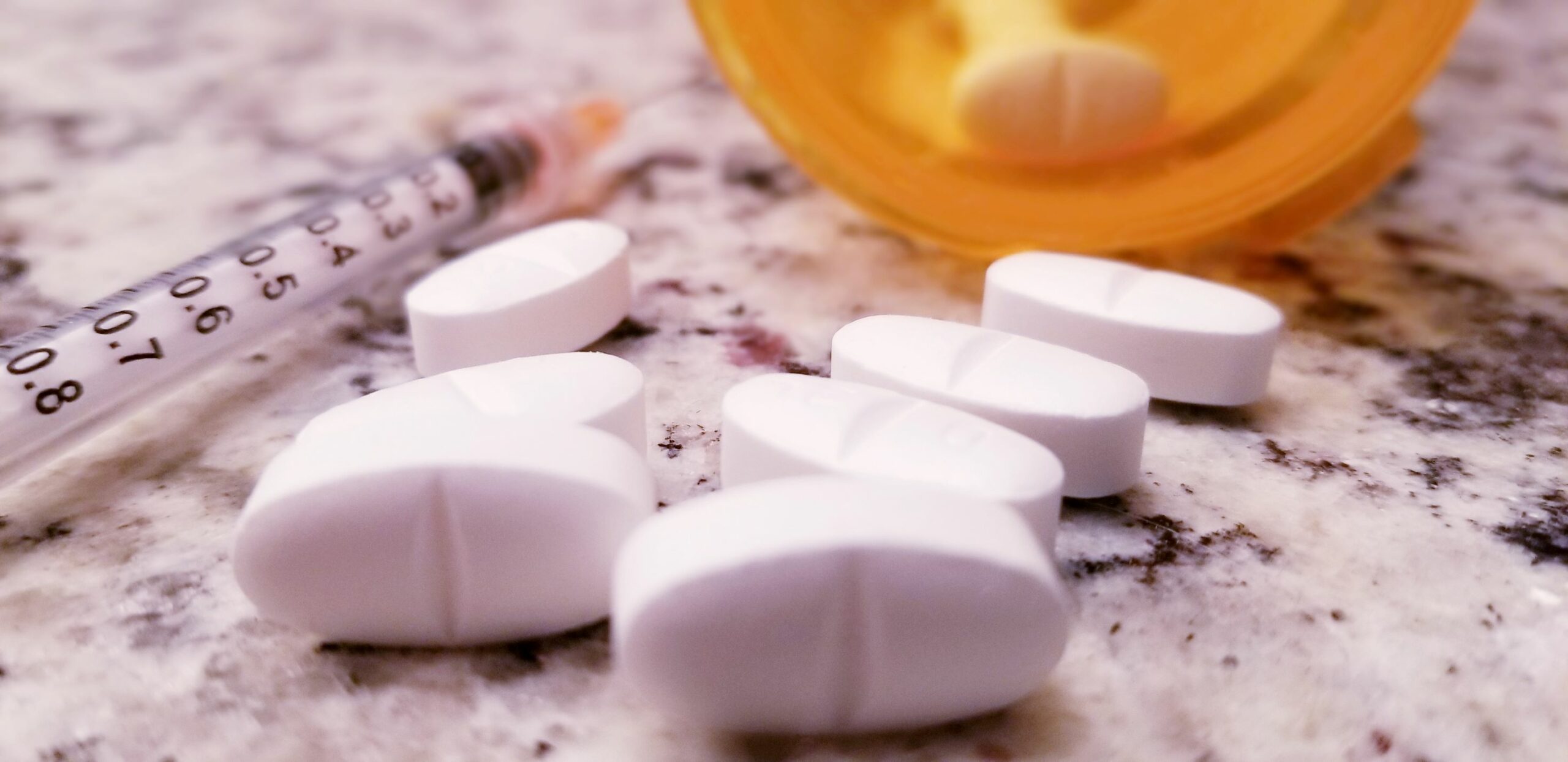 open pill bottle opioid addiction open pill bottle opioid addiction