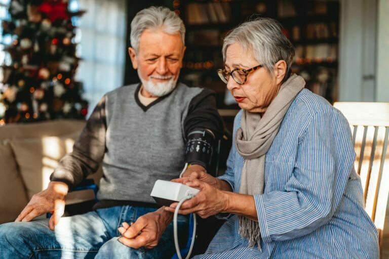 senior-couple-at-home-measuring-blood-pressure-ho-2021-12-09-05-41-16-utc2 senior-couple-at-home-measuring-blood-pressure-ho-2021-12-09-05-41-16-utc2