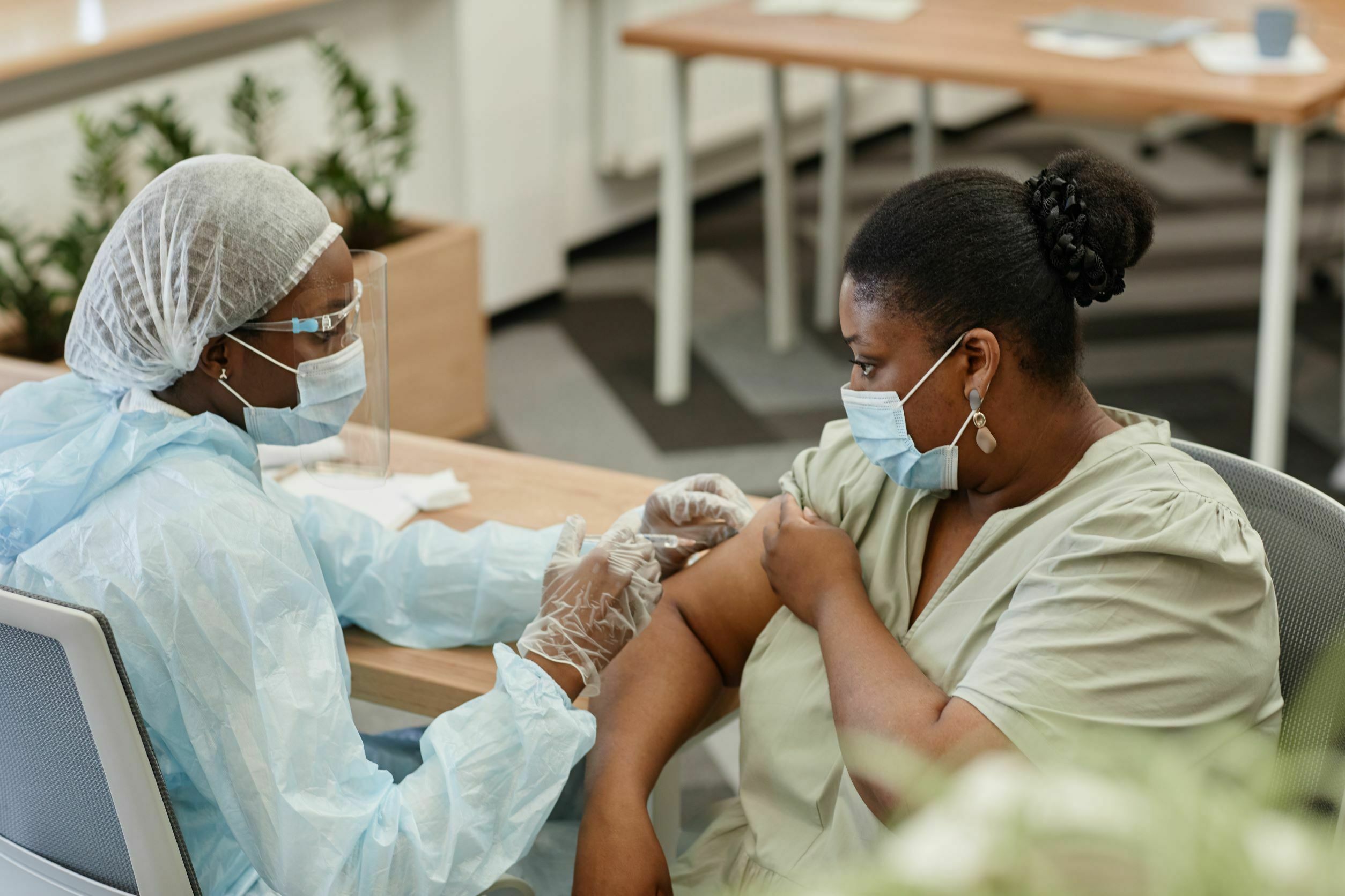 https://drkumo.com/wp-content/uploads/2022/01/black-woman-getting-vaccinated-2021-09-24-04-22-16-utc2.jpg