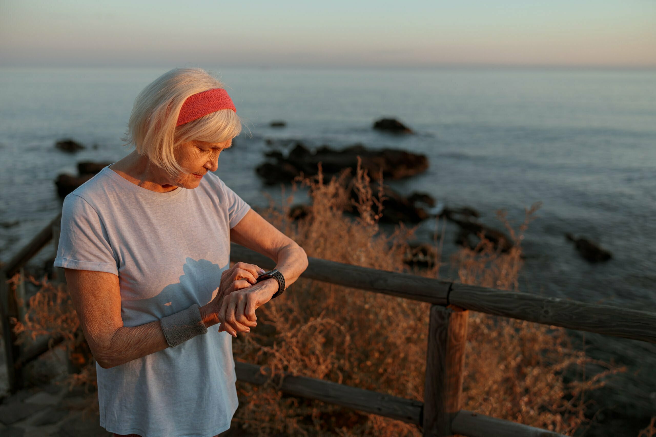 woman using smartwatch for remote care