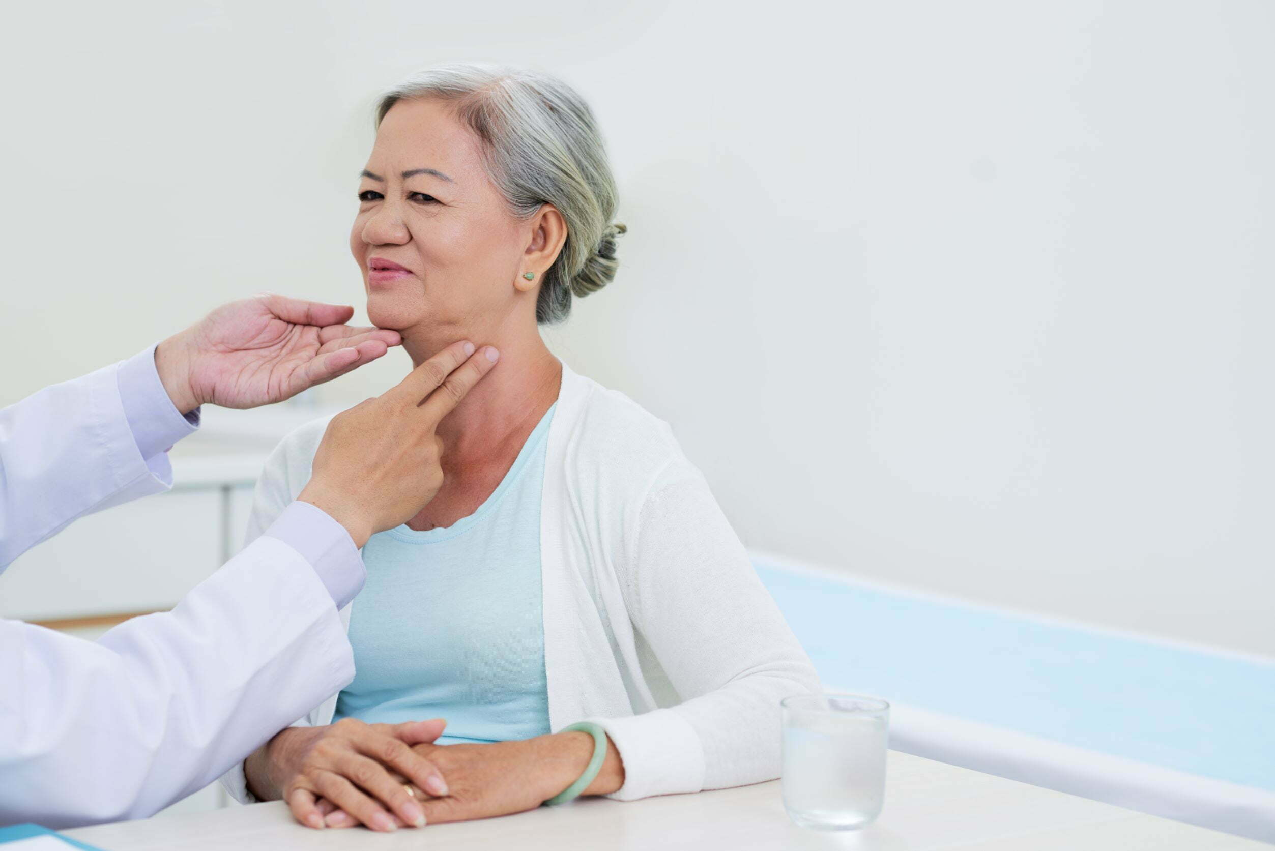 woman thyroid check-up woman thyroid check-up