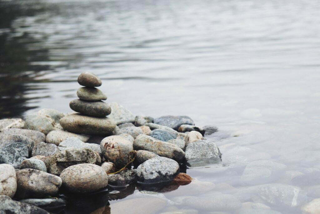 stacked rocks in water meditation