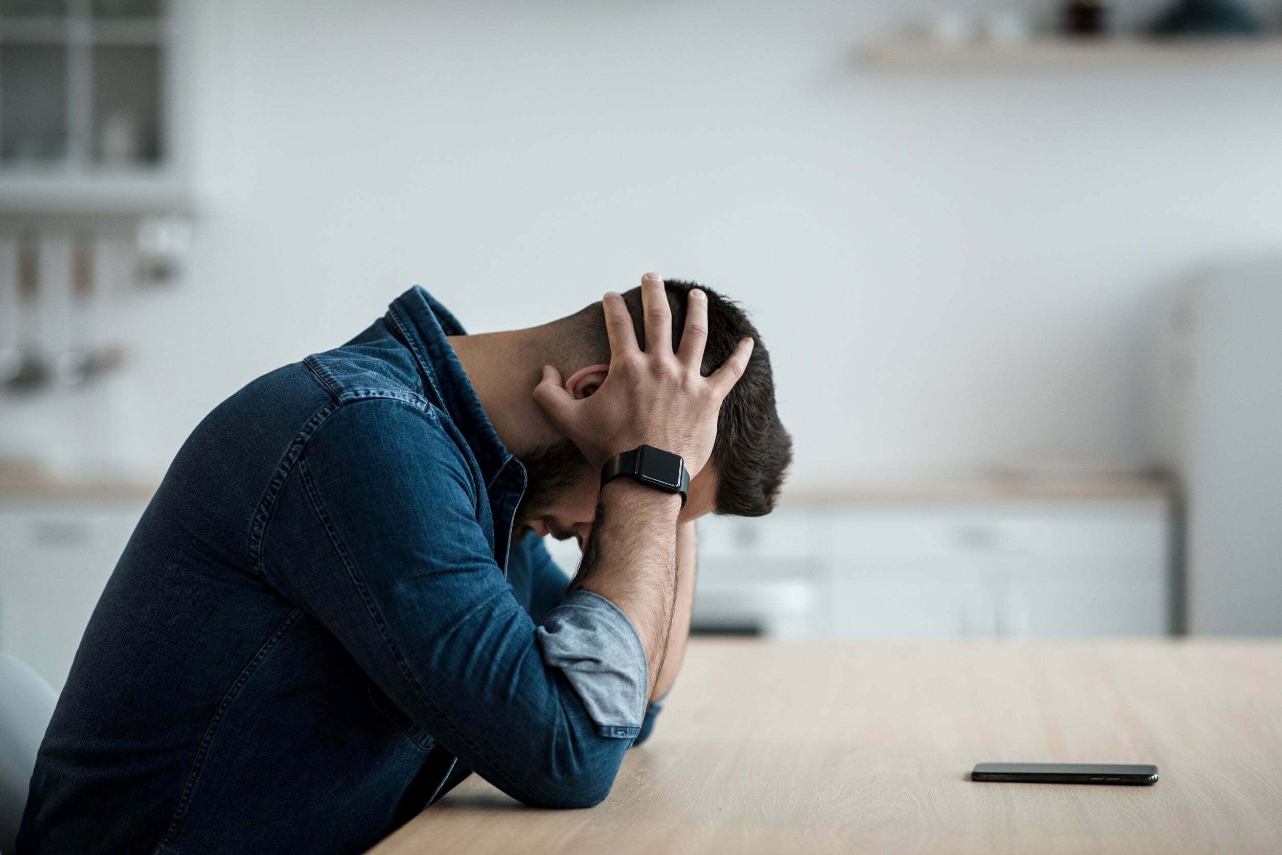 man having depression at home man having depression at home