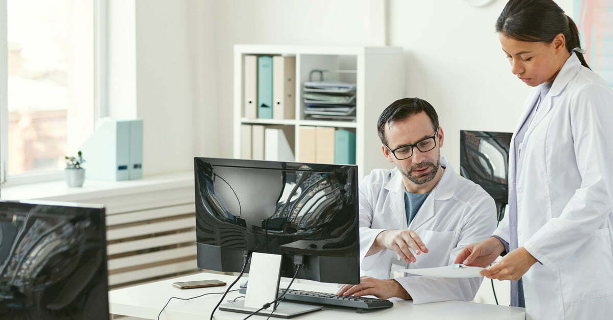 doctor, provider and nurse working in office