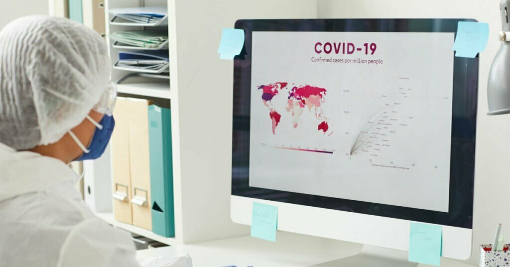 examining covid statistics in the world on computer