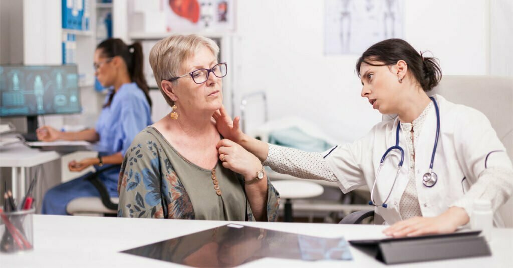 mature woman with thyroid discomfort