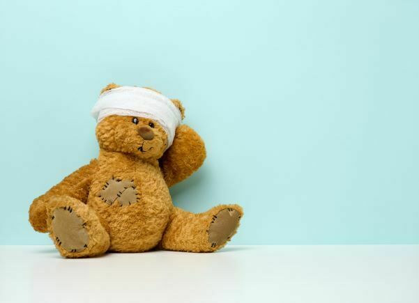 child teddy bear symbolizing childhood trauma