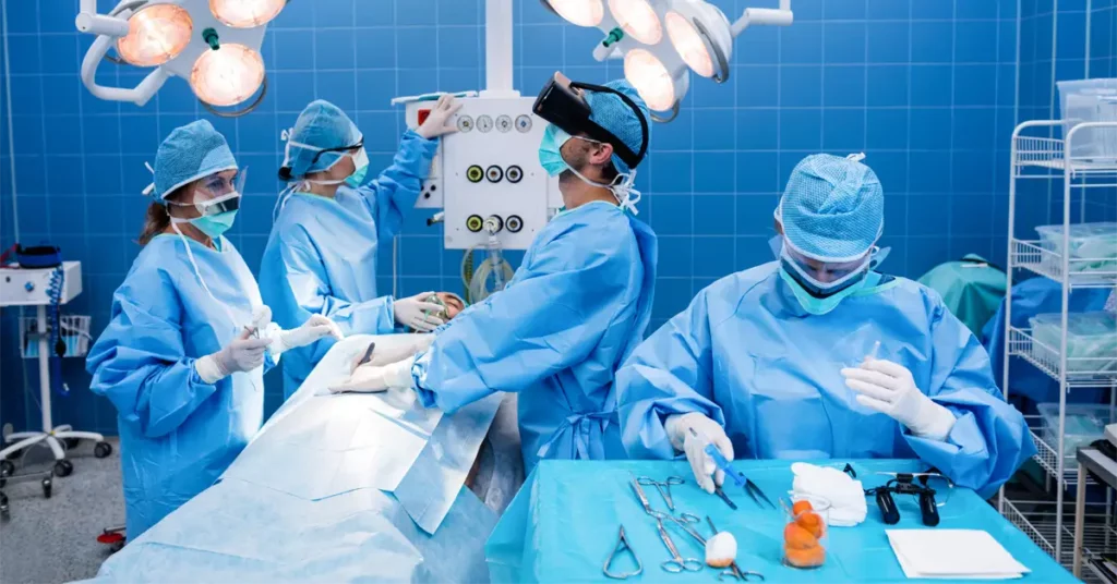 surgeons performing operation post operative care