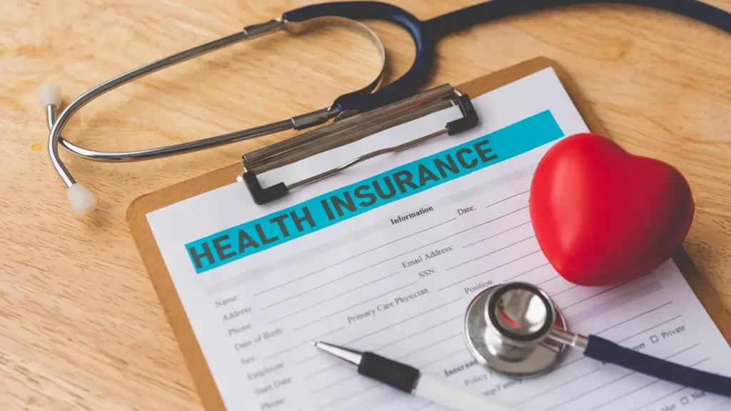 insurance industry challenges stethoscope and insurance document