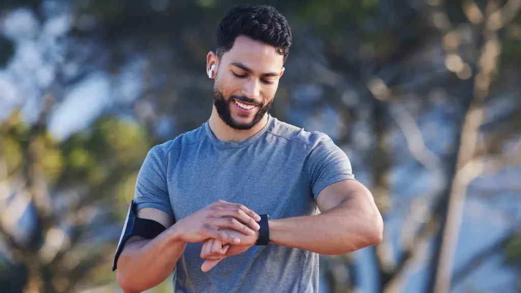 runner with best health wearables like fitness smartwatch