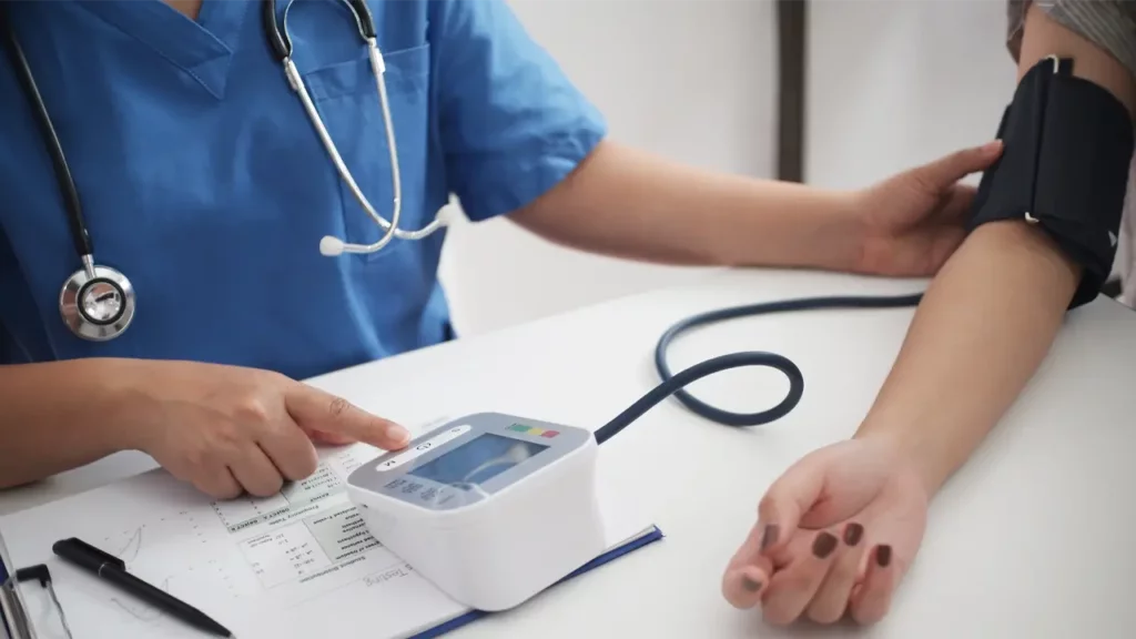inconsistent blood pressure readings being rechecked by doctor