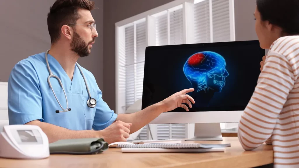 doctor showing brain scan