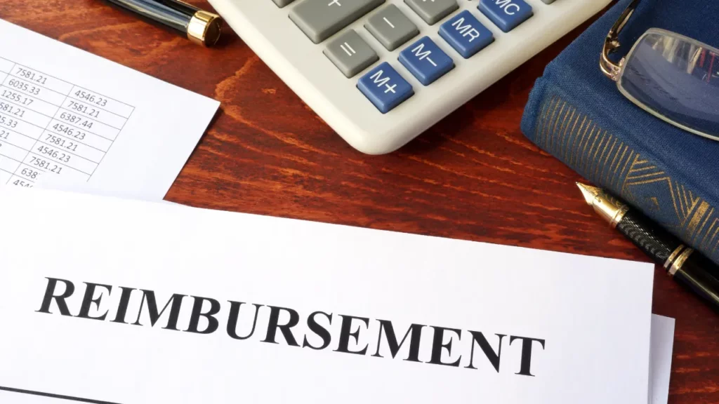 document with title reimbursement on table