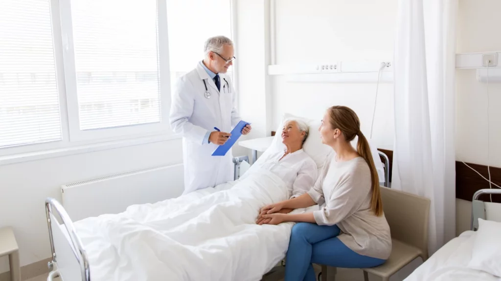 woman patient with daughter and doctor providing chronic care