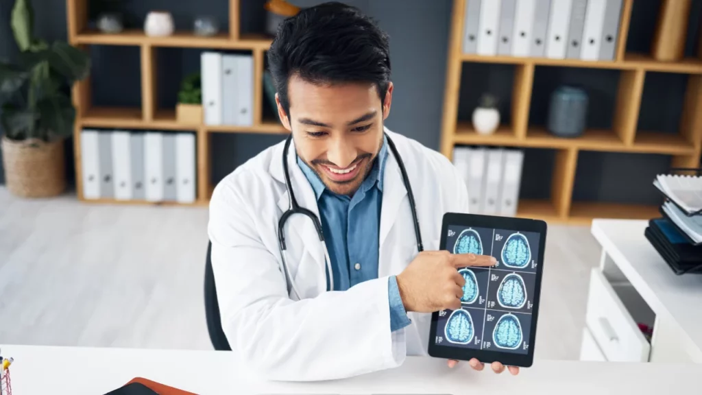 doctor with brain scan on tablet for Telehealth consultation