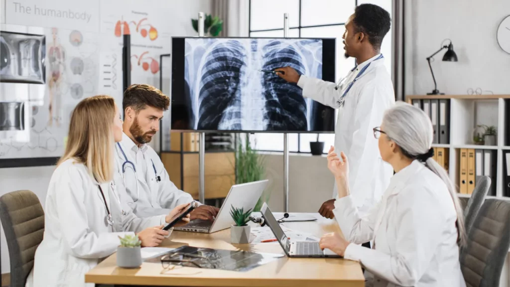 doctors checking respiratory x-ray for remote monitoring